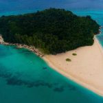 The featured image for our Bamboo Island tour at Sunrise with the island seen from drone above.