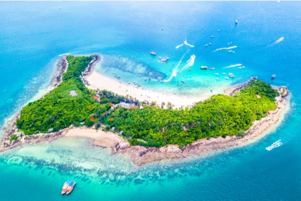 An aerial view of the Coral Island area with boats arriving in droves