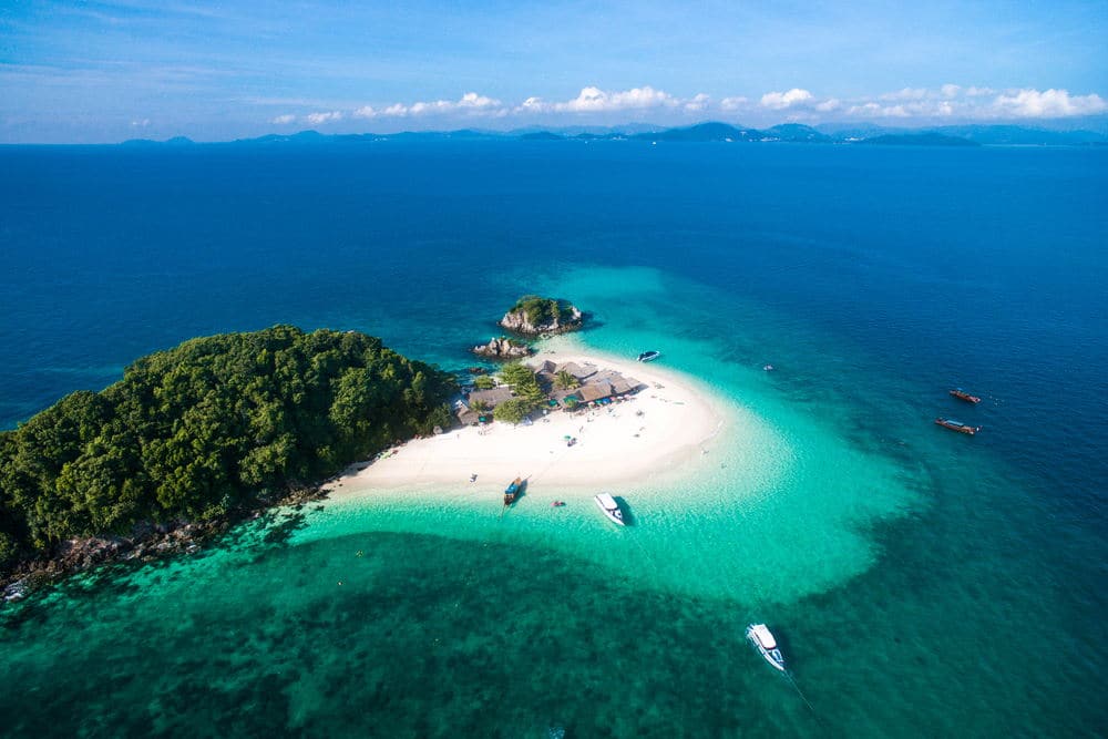 Stunning view of an island with boats