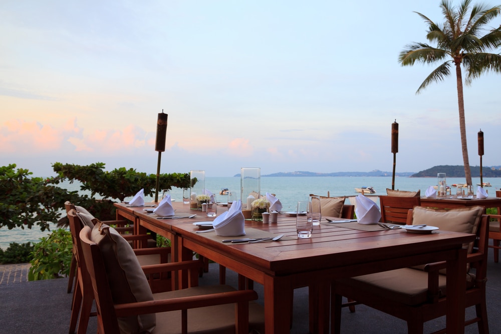 Outdoor dining at a beachfront restaurant in Phuket