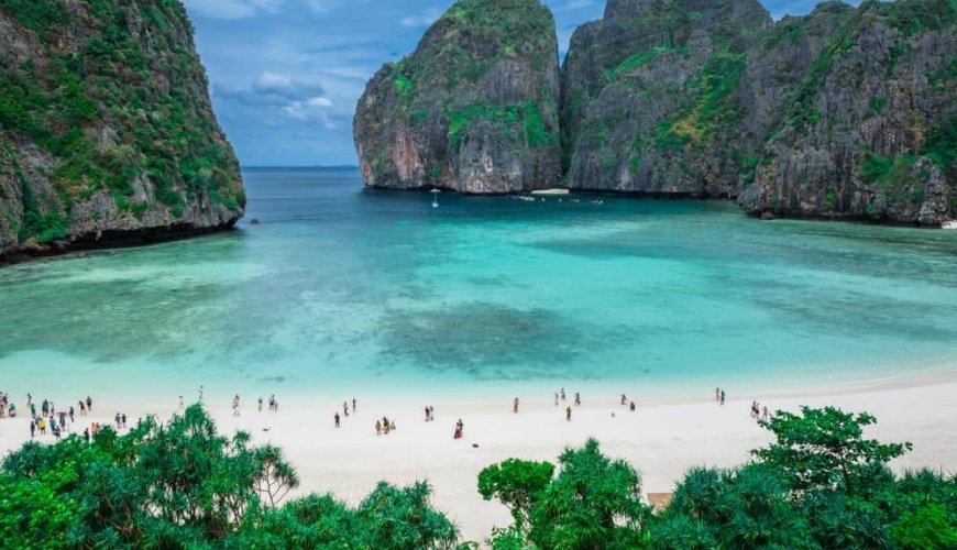 maya bay with people lying on the shore