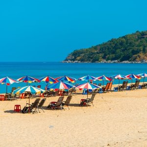 Hundreds of Sunbeds spread out across the world famous Karon Beach on a hot summer day