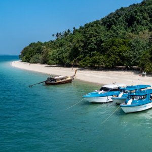 Phi Phi Private Boat Tour with boats anchored at Bamboo Island